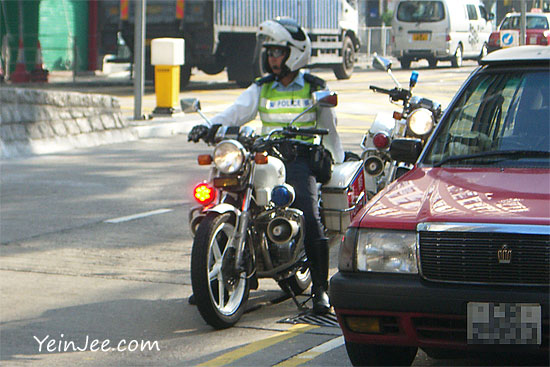 Hong Kong police and taxi