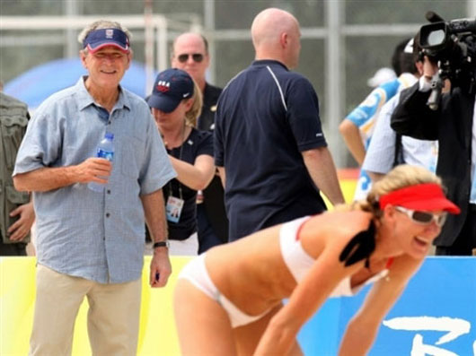 US president George Bush checking the women beach volleyball players at Beijing Olympics