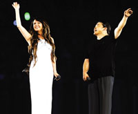 British singer Sarah Brightman and Chinese singer Liu Huan at Beijing Olympics opening ceremony