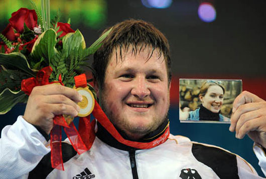 Picture of German weightlifter Matthias Steiner with his wife photo at Beijing Olympics 2008