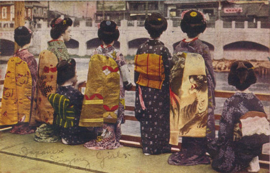 Vintage postcard of Japanese geisha in traditional kimono