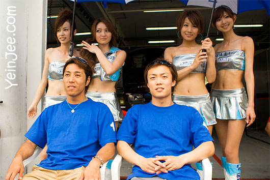 Japanese GT drivers Kazuki Hoshino, Hironobu Yasuda, and Mola race queens at Super GT Malaysia 2008