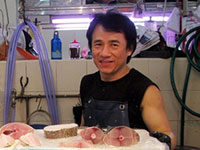 Jackie Chan sells fish in Singapore