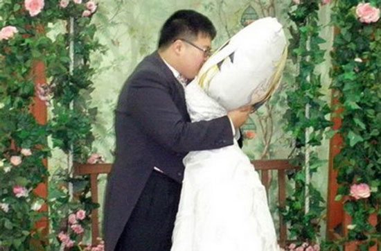 Korean guy married Dakimakura pillow