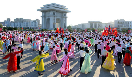 North Koreans celebrate Kim Jong-il re-election