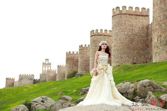 Angela Chang photoshoot at Spain Avila Castle Wall