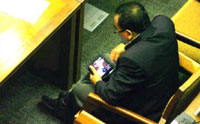 Indonesia politician watching blue movie at parliament